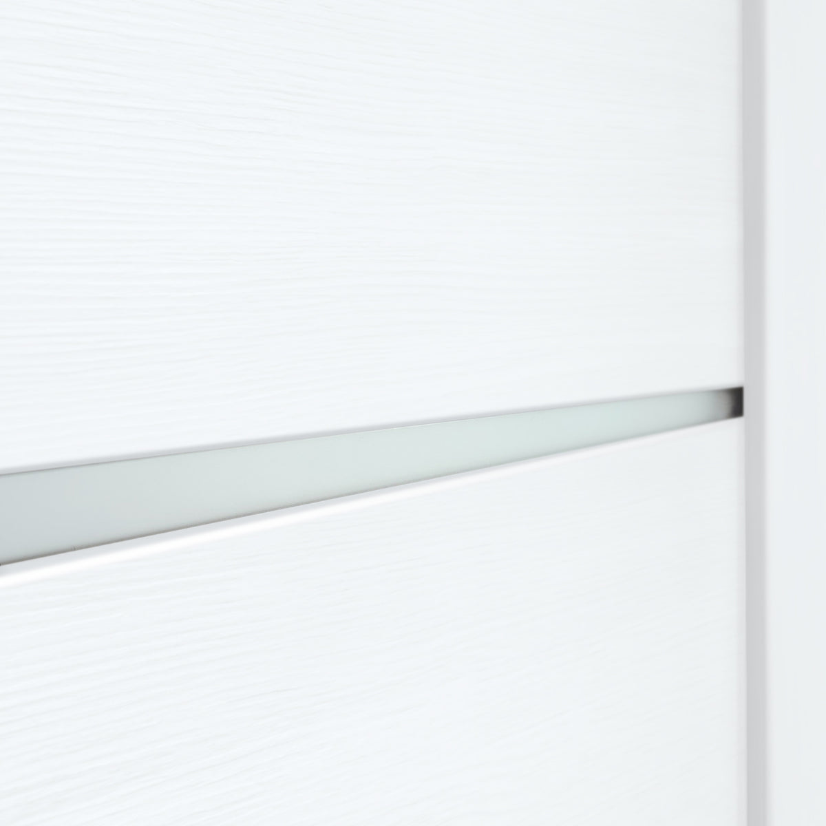 Close-up of a frosted-glass insert in Miami White door slab with white PVC wood-look finish