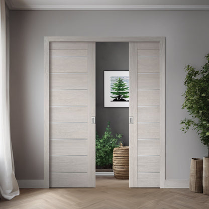 Two Miami Light Gray slabs shown in a double pocket-door application; one slab sold, system hardware and preparation not included