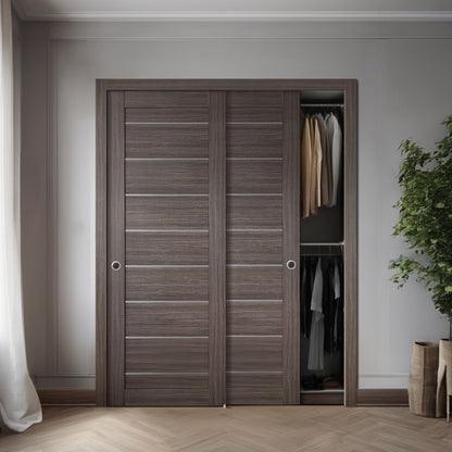 Two Miami Gray Brown slabs shown in a double pocket-door application; one slab sold, system hardware and preparation not included