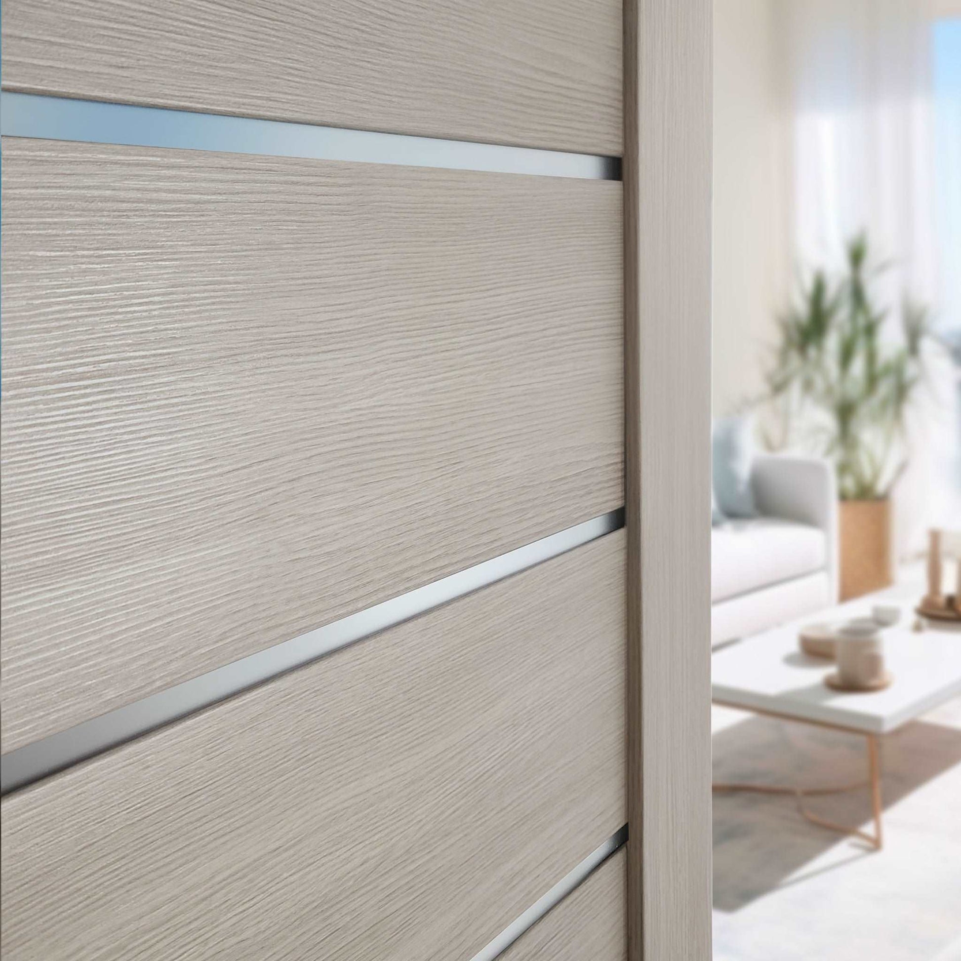 Close-up of frosted-glass inserts and beige PVC wood-look finish on Miami XGM-05 door slab