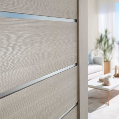 Close-up of frosted-glass inserts and beige PVC wood-look finish on Miami XGM-05 door slab