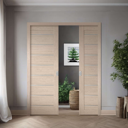 Two Miami XGM-05 slabs shown in a double pocket-door application; one slab sold, frame, hardware, and preparation not included